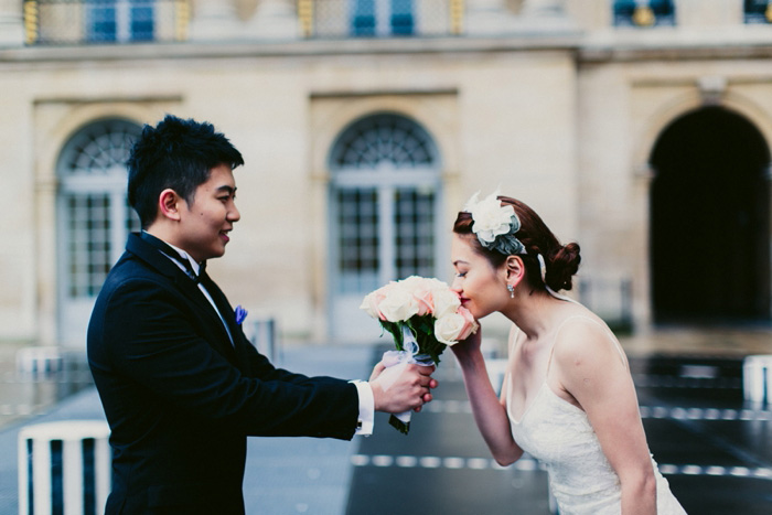 bride smelling bouquet