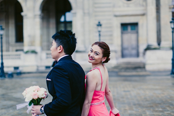 bride and groom walking in Paris