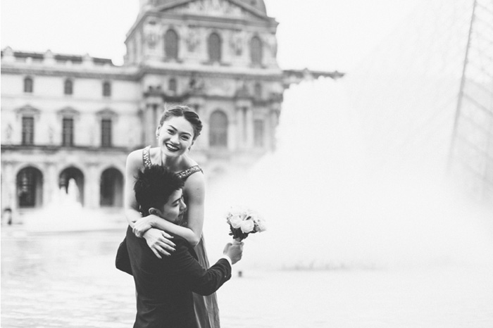 groom lifting up bride