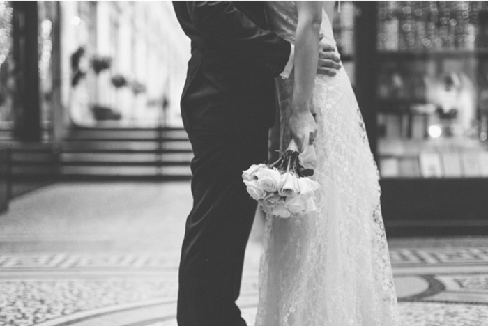 bride and groom embracing