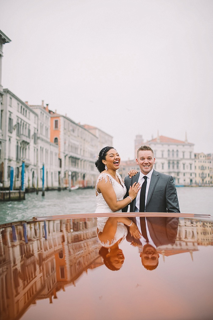 bride and groom on Venice canal boat