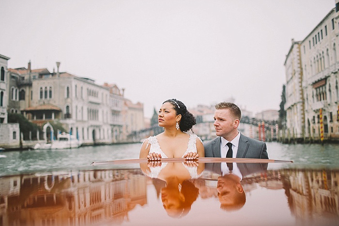bride and groom on Venice canal boat