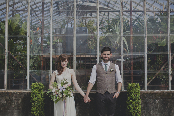 wedding portrait in front of greenhouse