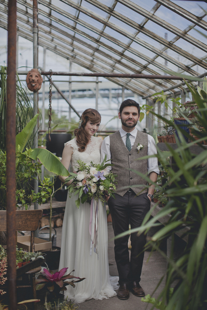 wedding portrait in front of greenhouse