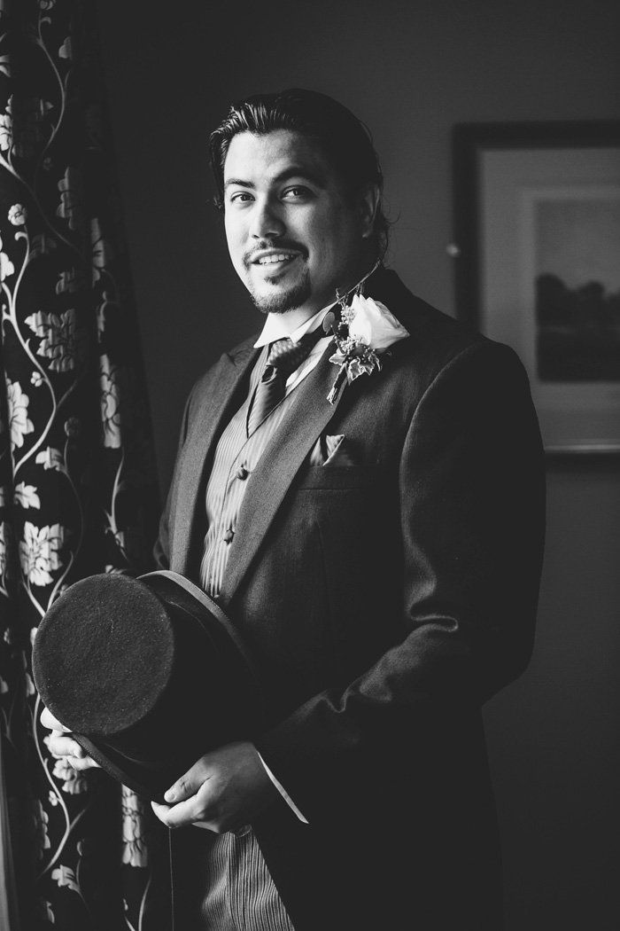 black and white groom portrait