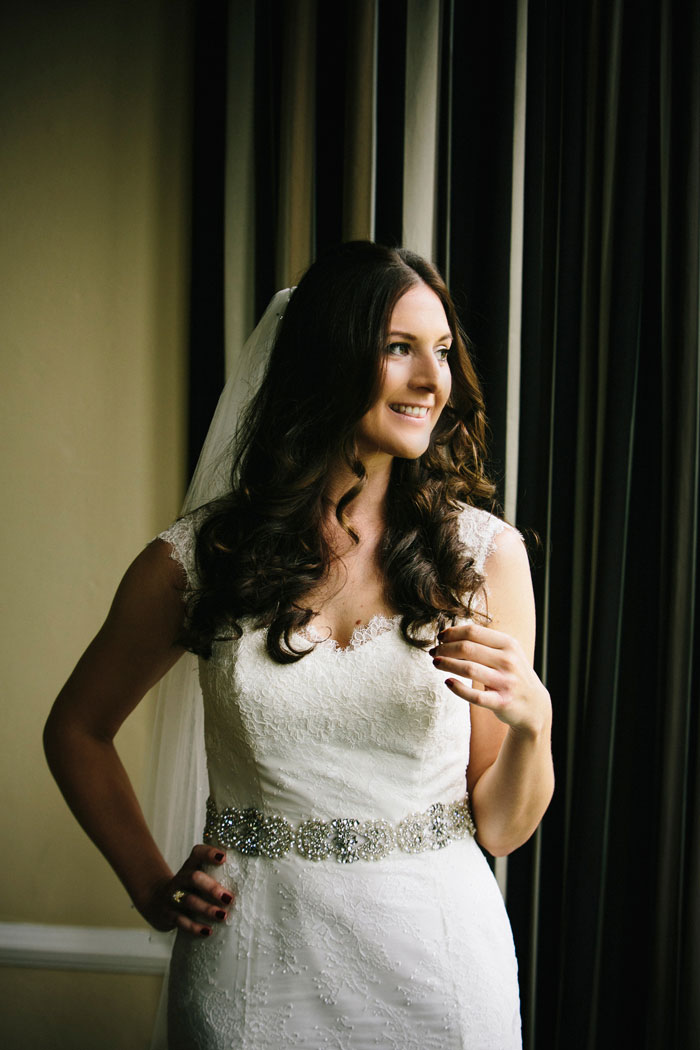 bride portait next to window