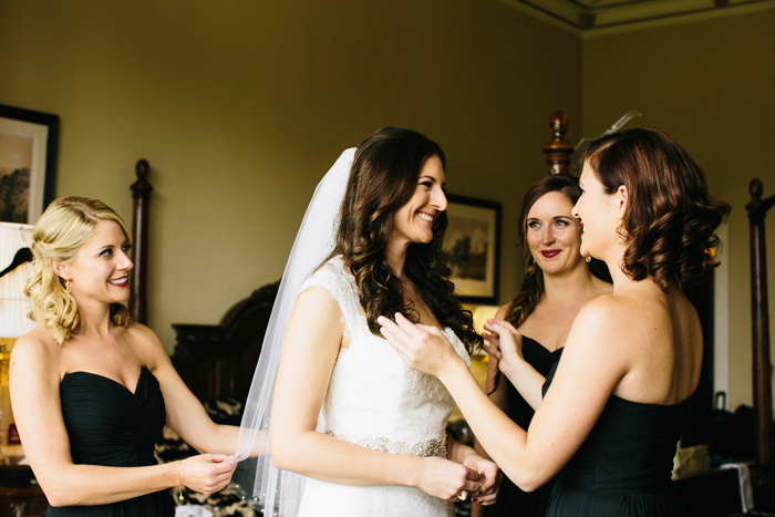 bride getting ready with her bridesmaids