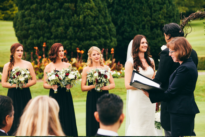 outdoor wedding ceremony on manor grounds