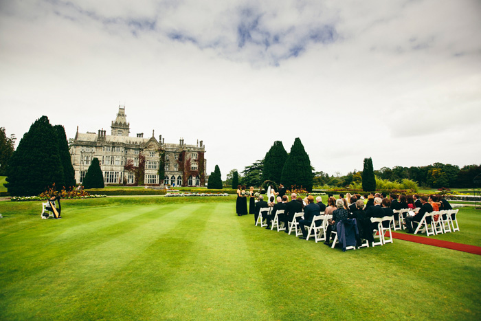 outdoor wedding ceremony on manor grounds