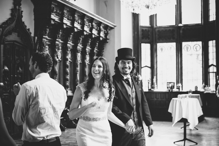 bride and groom entering reception