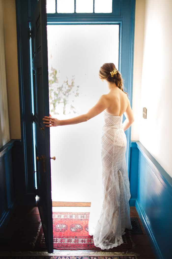 bride looking out door