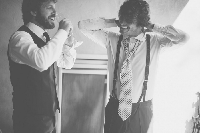 groom getting ready with groomsman