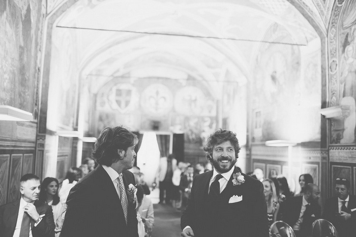 groom and groomsman waiting at the church