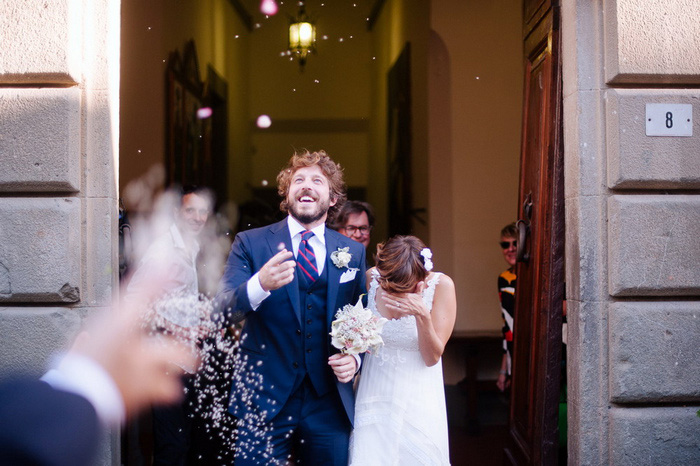 bride and groom exiting the church