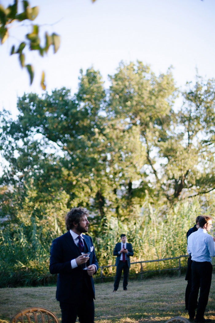 groom at outdoor wedding reception