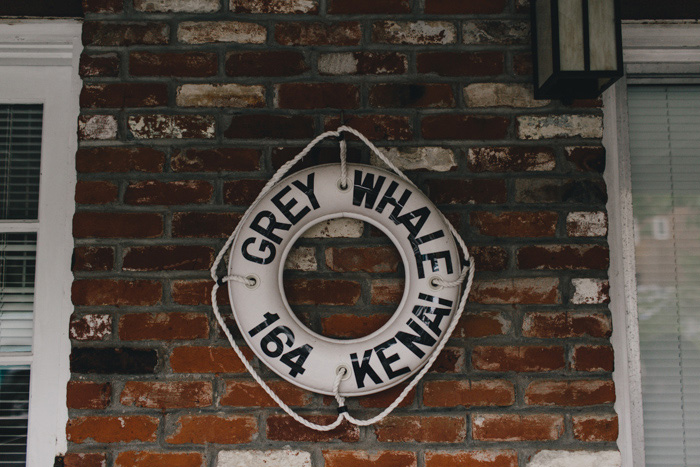 life preserver on brick wall