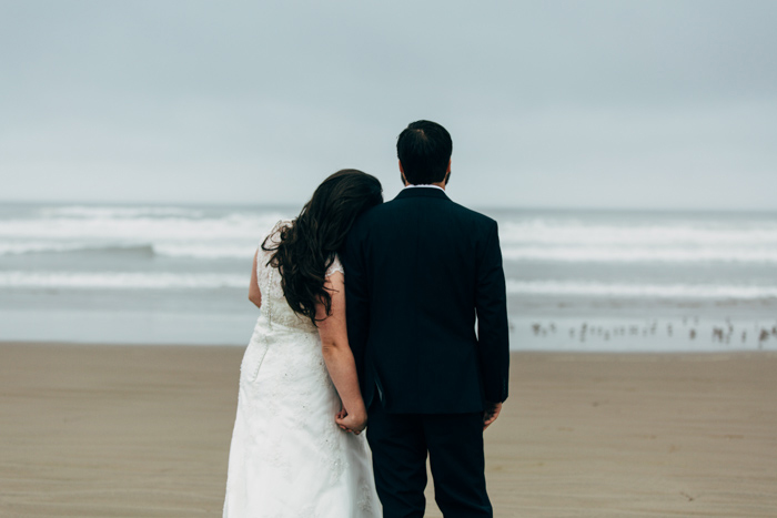 bride and groom on beach