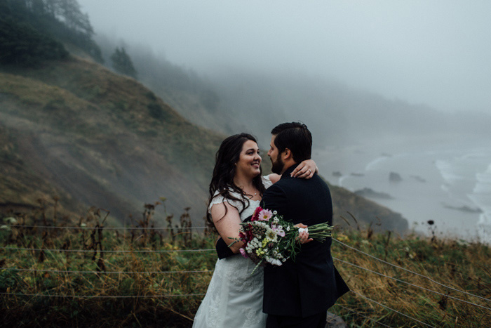 bride and groom embracing