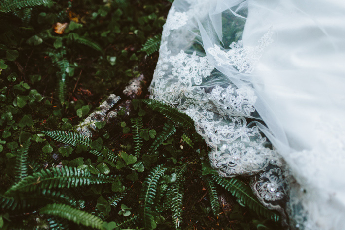 bride's train on forest floor