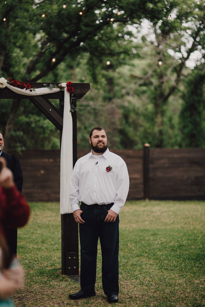 groom waiting at the altar