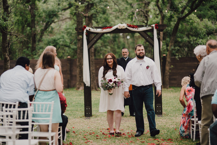 bride and groom walking down the aisle