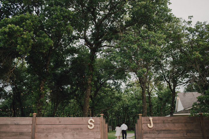 bride and groom walking away