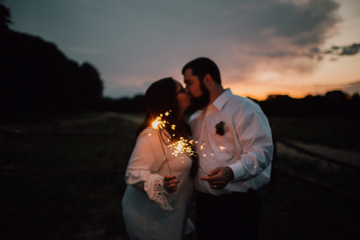 bride and groom portrait with sparklers