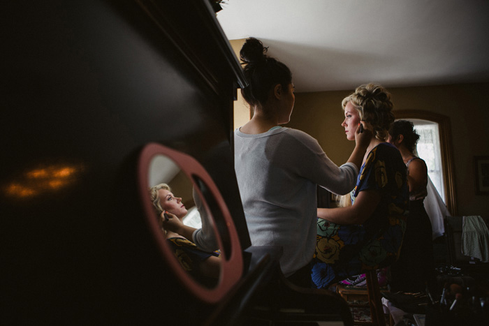 bride getting her make-up done