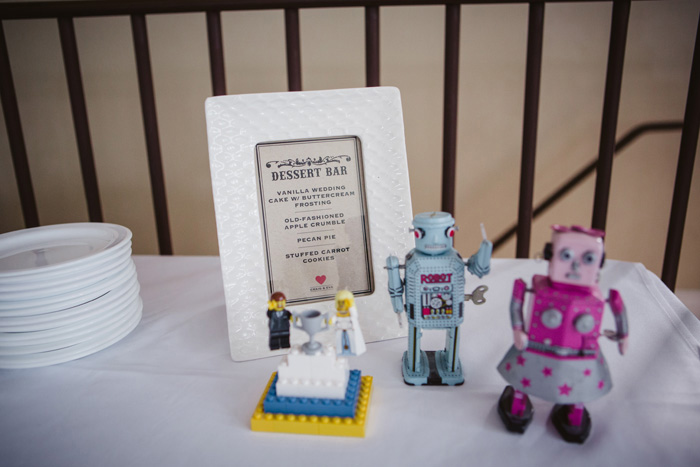 dessert table sign with vintage toys