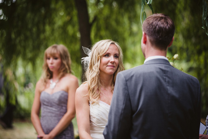 bride looking at groom during wedding ceremony