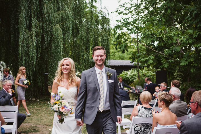 bride and groom walking down the aisle