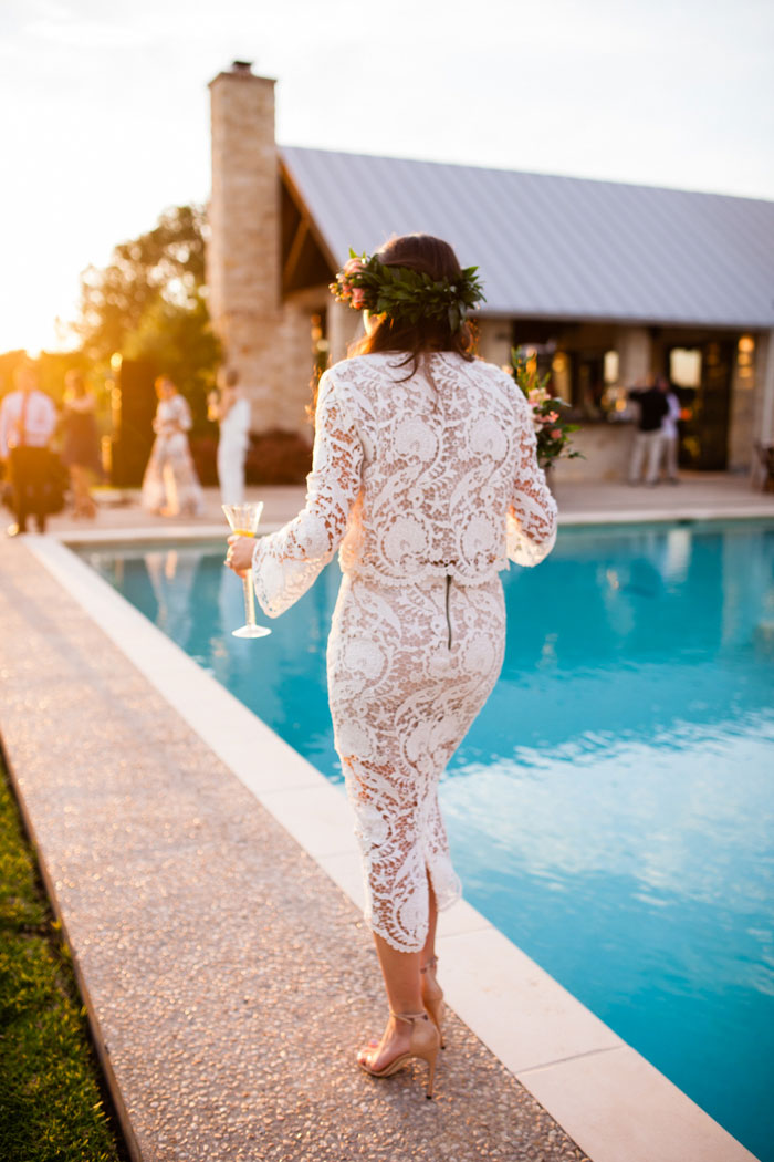 bride walking by pool