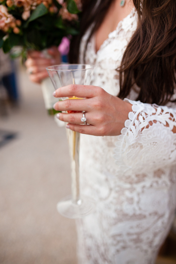 bride holding champagne