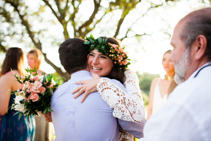 bride hugging wedding guest