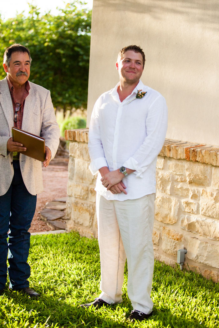 groom waiting at the altar