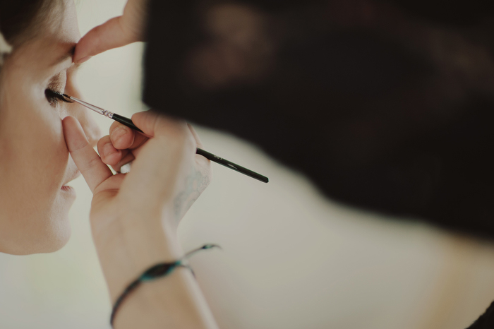 bride getting her make-up done