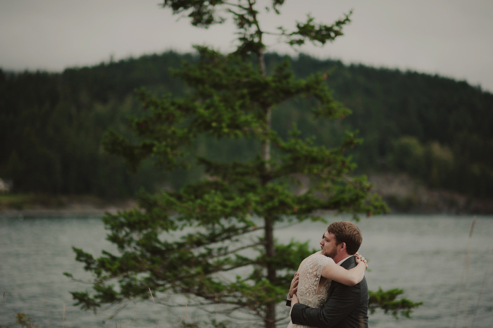 bride and groom hugging