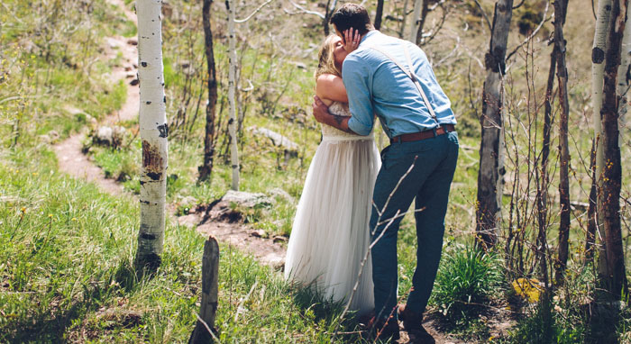 bride and groom first kiss