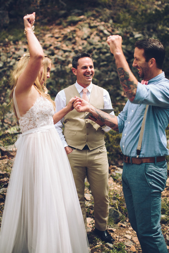 bride and groom celebrating after saying I do