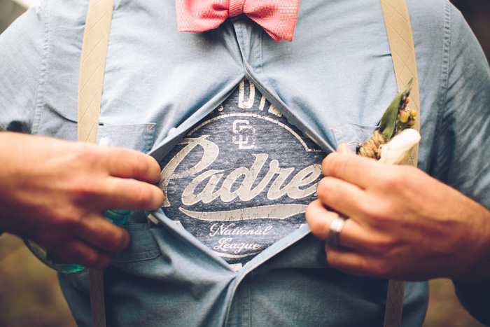 groom revealing Padre shirt under button-up