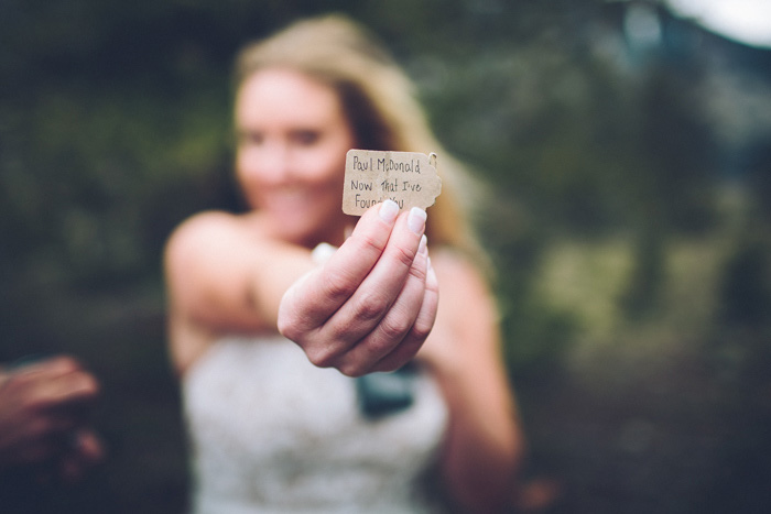 bride holding note