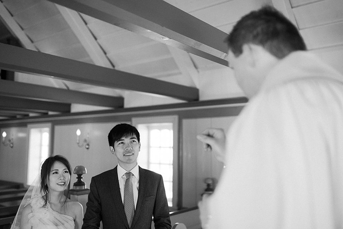 bride and groom in small Iceland chapel