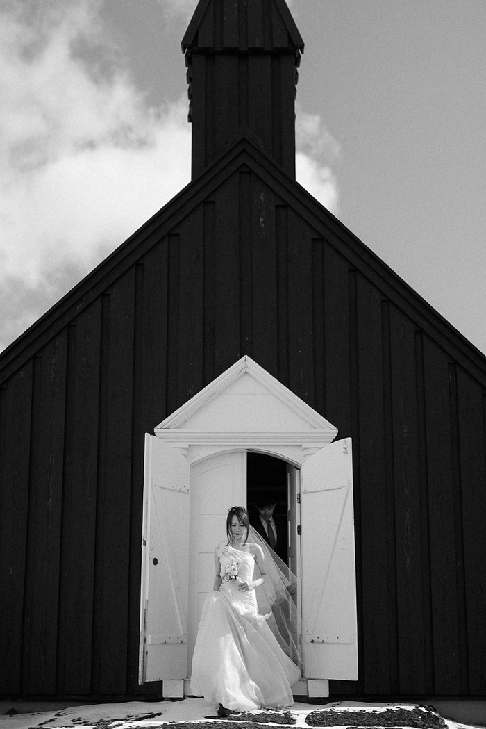 bride and groom leaving chapel
