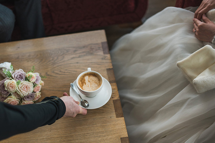 bride and groom with coffee