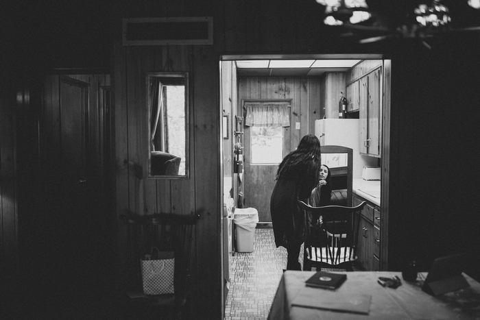 bride getting ready in cabin