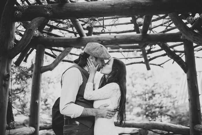 bride and groom first kiss