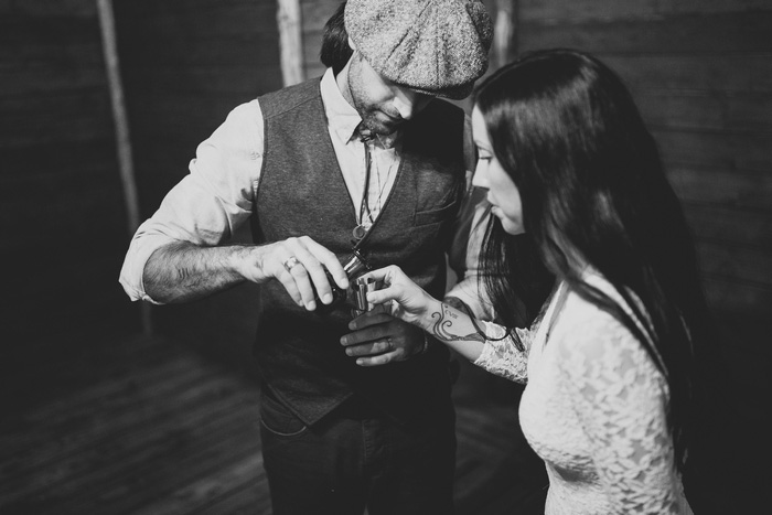 bride and groom taking a shot