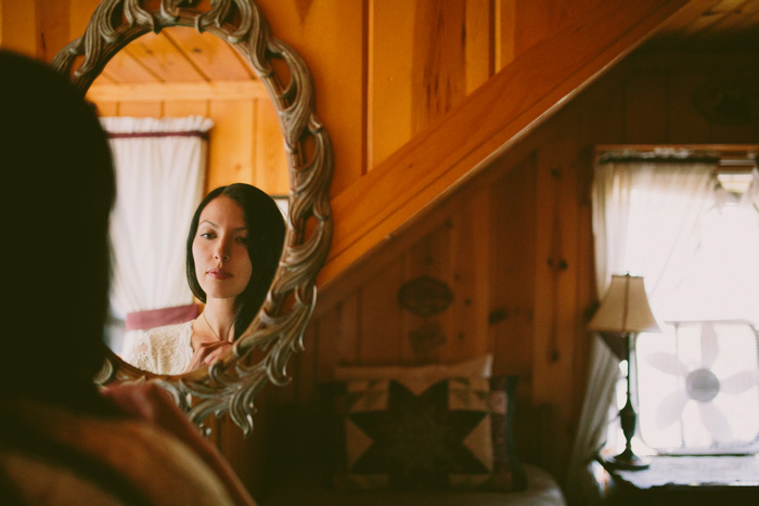 bride's reflection in mirror