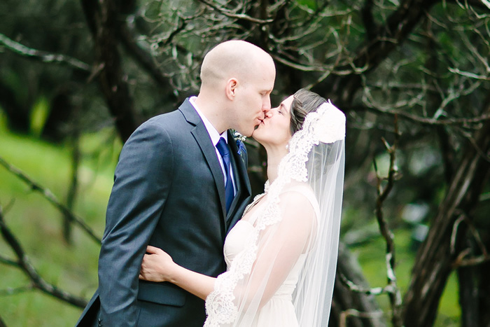 bride and groom kissing