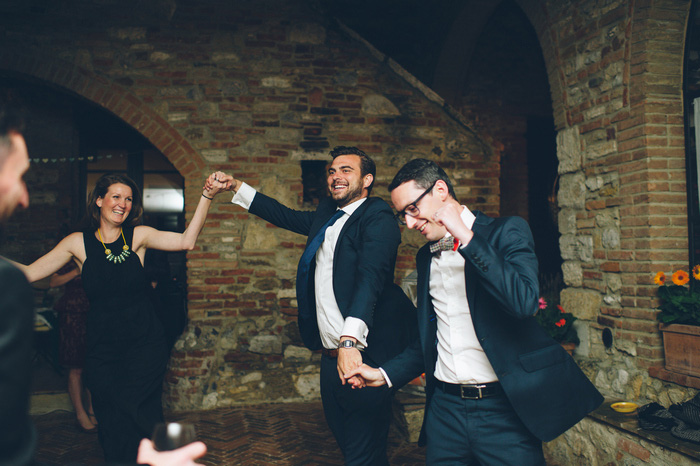 groom dancing with guests